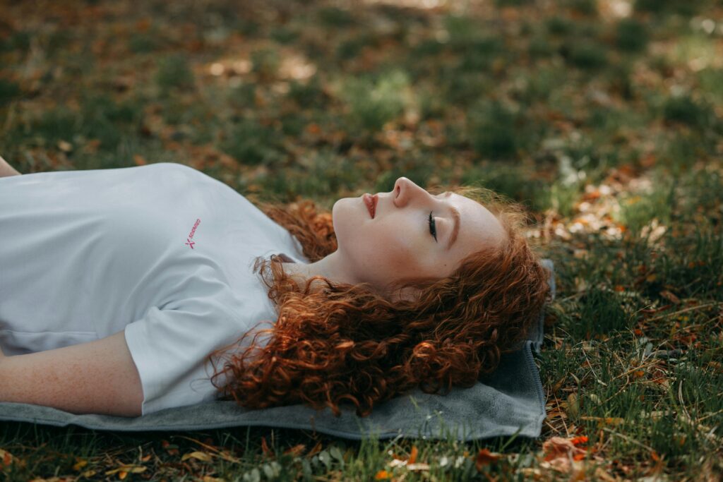 Photo Of Woman Laying On Ground